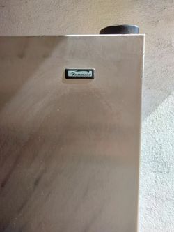 Kenmore stainless steel refrigerator freezer side by side