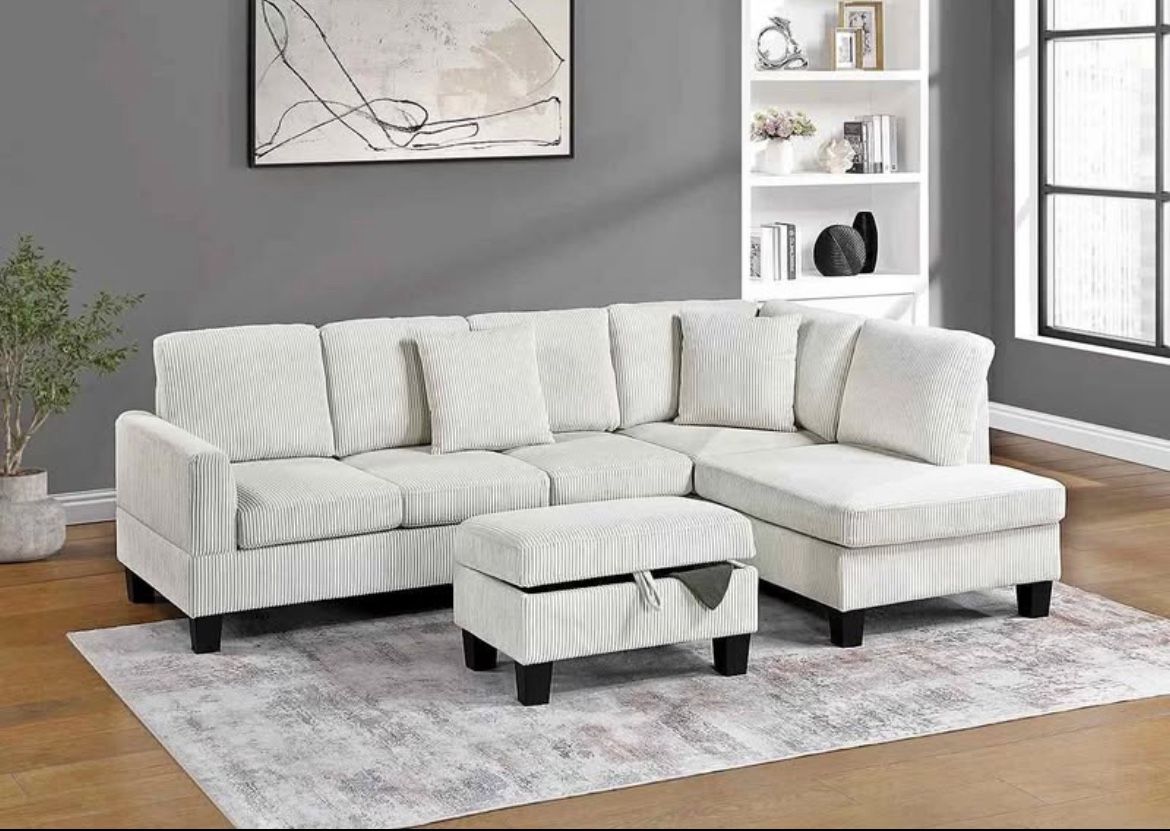 corduroy Sectional Sofa with storage ottoman and 2 accent pillows.