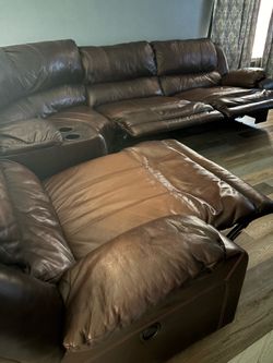 Large brown leather sectional and chase chair