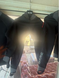 Diving/surfing pants; provide warmth when in the water and feature antimicrobial properties. EXOWEAR pants (men's), size S. Matching top also availabl