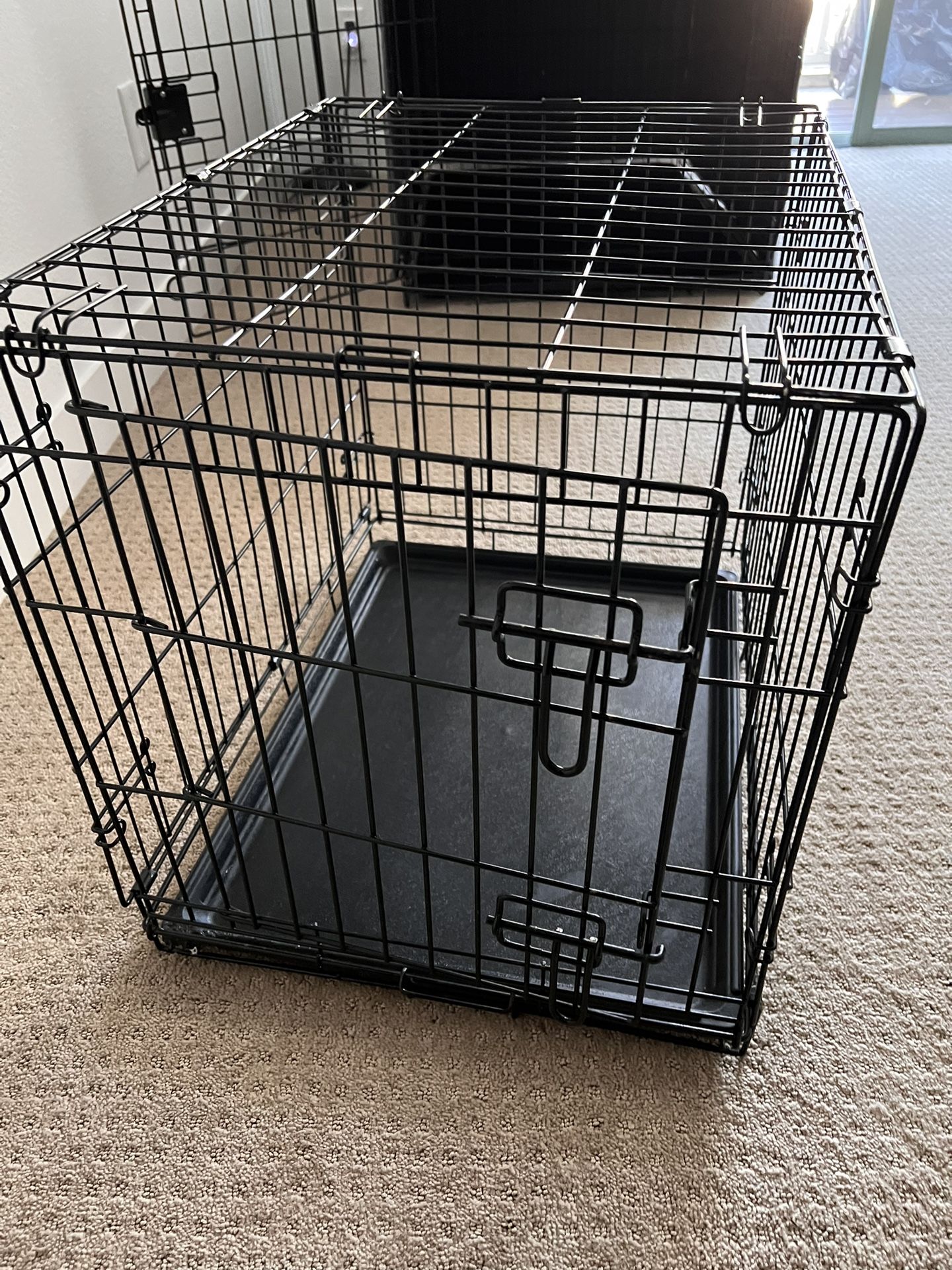 SMALL DOG CAGE $30.00