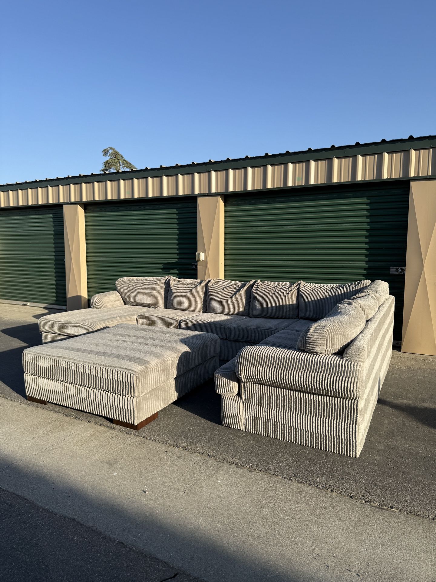 Luxurious Platinum Haze Corduroy U-Sectional w/ Oversized Ottoman - Free Delivery