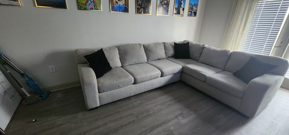 Comfortable Gray Sectional Couch From Rooms To Go