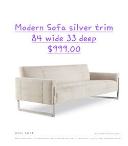 Sofa with silver trim We are located at 2811 East Bell road. Another Time Around Furniture.