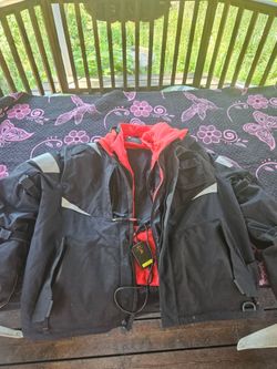 Heated armored riding jacket