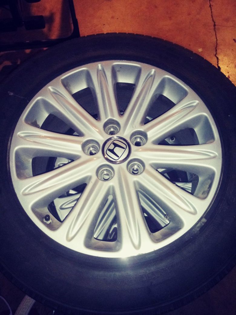 2008 Honda Touring Rims with tires,235-710R460A this are the tire and rim size.