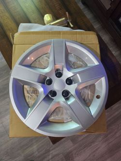 Brand new 17" silver hub caps for most GM Cars