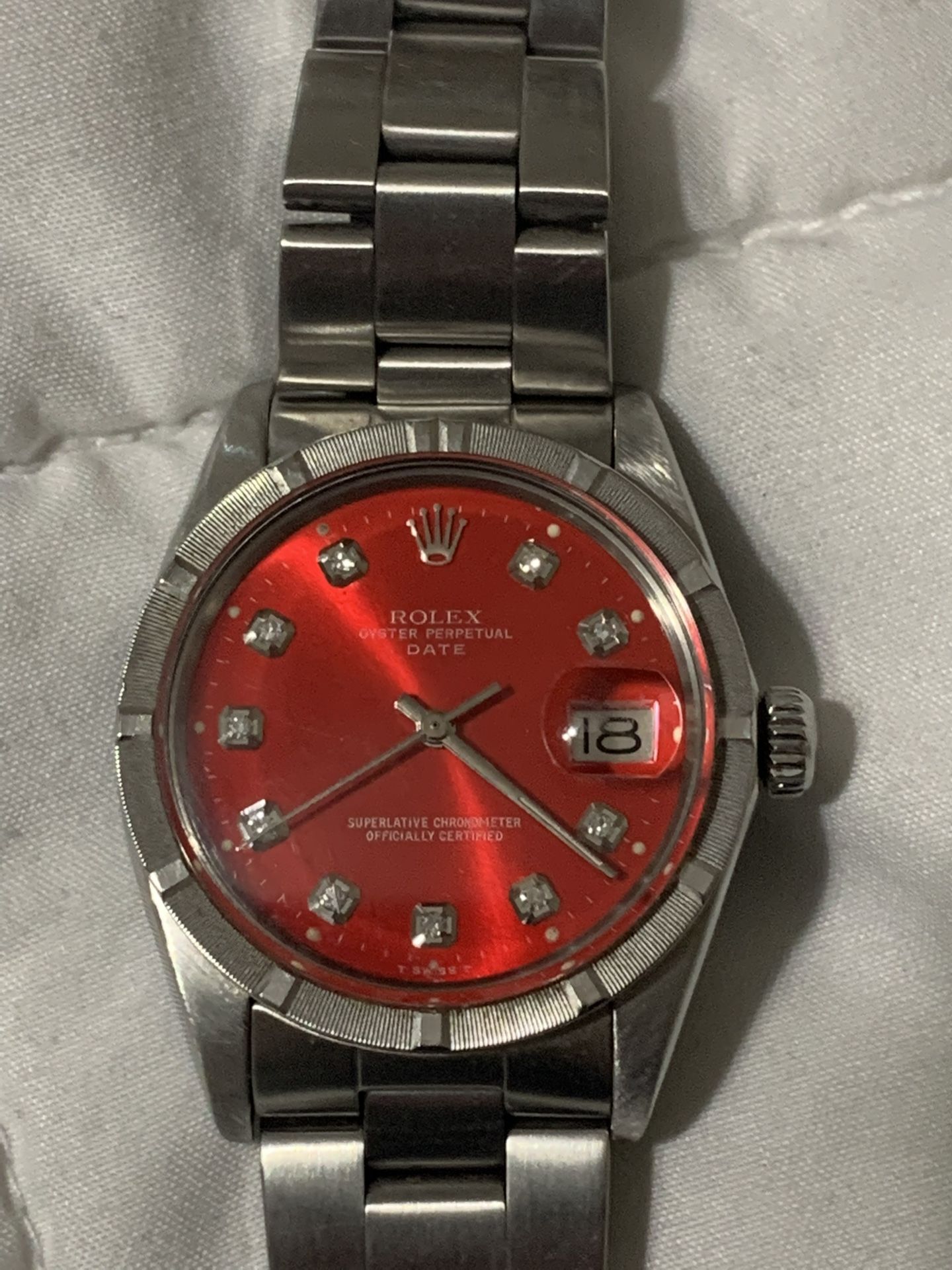 Authentic ROLEX Stainless Steel Date Model . Red Diamond Dial