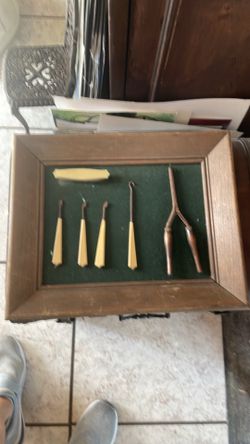 Display nail implements and curling iron 1920s Display nail implements and curling iron 1920s