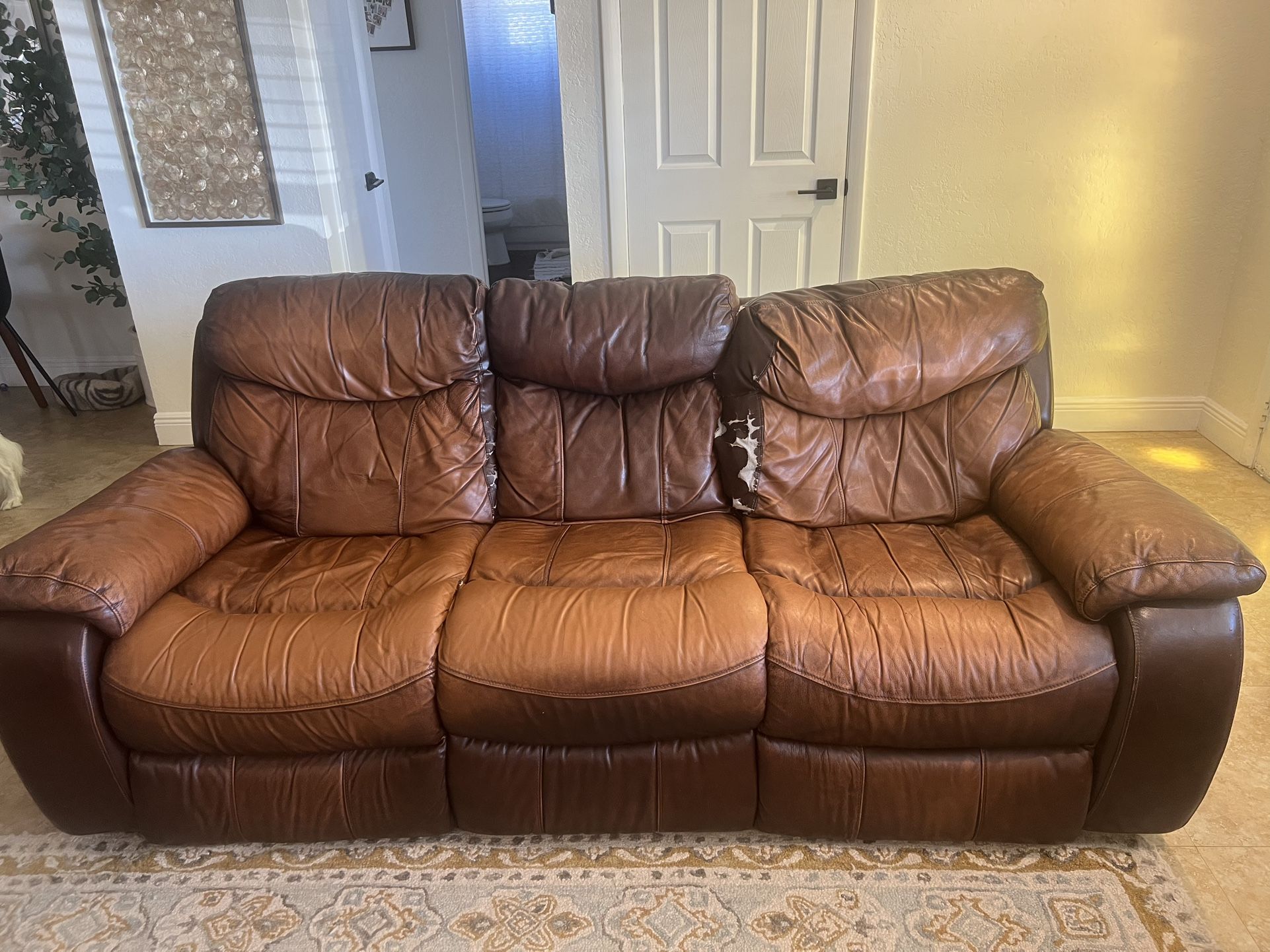 FREE! Two Leather Recliner Sofas 82” 