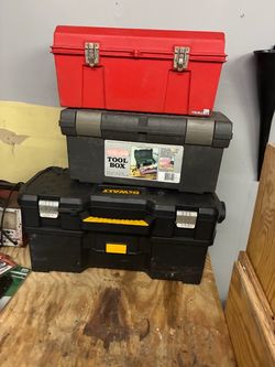 Three tool boxes, one DeWalt for