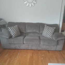 Two Peice  Sofa Set With Pillows And Extras