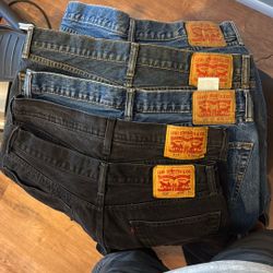 Levi (5) Pair $50. (2x) Black 34 X30, Blue (3x) 36x30