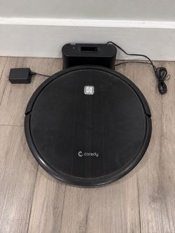Coredy Robot Vacuum Cleaner with Charging Dock – Used