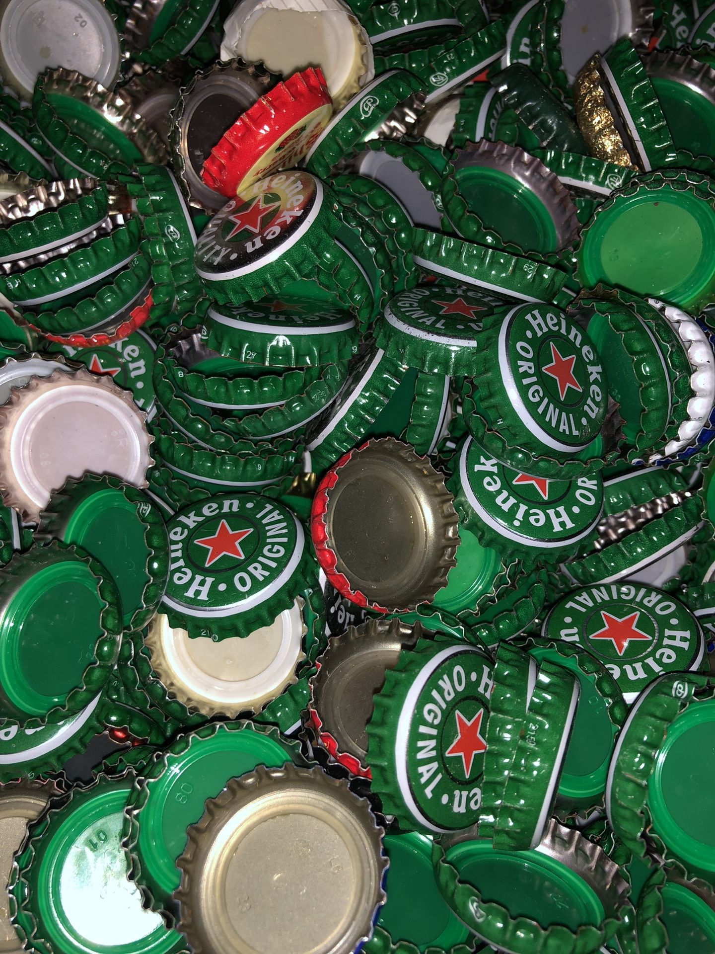 105 classic and Vintage Inspired Bottle Caps mostly Heineken 