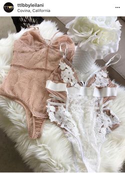 Lace and fishnet bodysuits