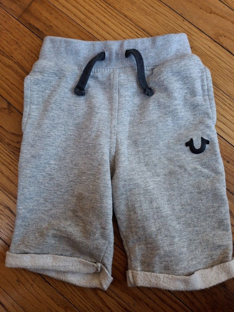 Soft and cozy joggers with a stylish logo. Ideal for play and relaxation.