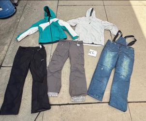 Selection of women’s size XL, 2XL and 3XL snow/ ski clothes. Winter jackets pants and bibs