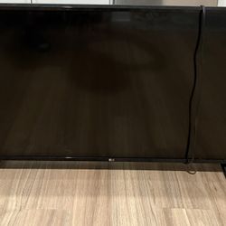 LG Smart Flatscreen 37.5” x 21.1” + Amazon Firestick 