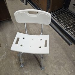 shower chair with a backrest.