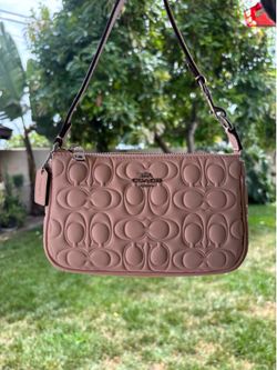 pink coach mini purse/bag