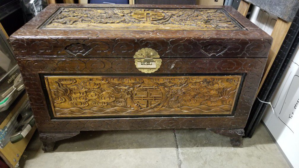 Oriental inspired hand carved trunk