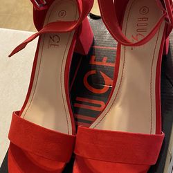 Never worn red heels size 8