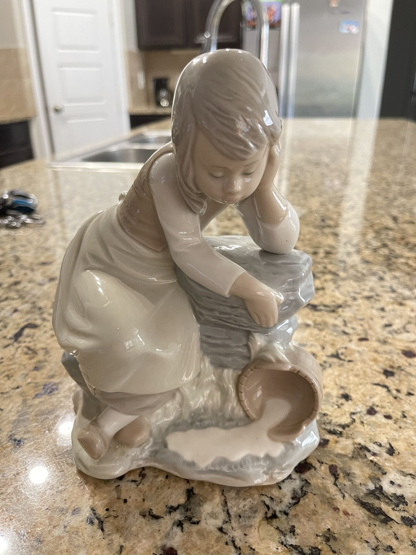 Lladro Figurine: “Don’t Cry Over Spilled Milk”