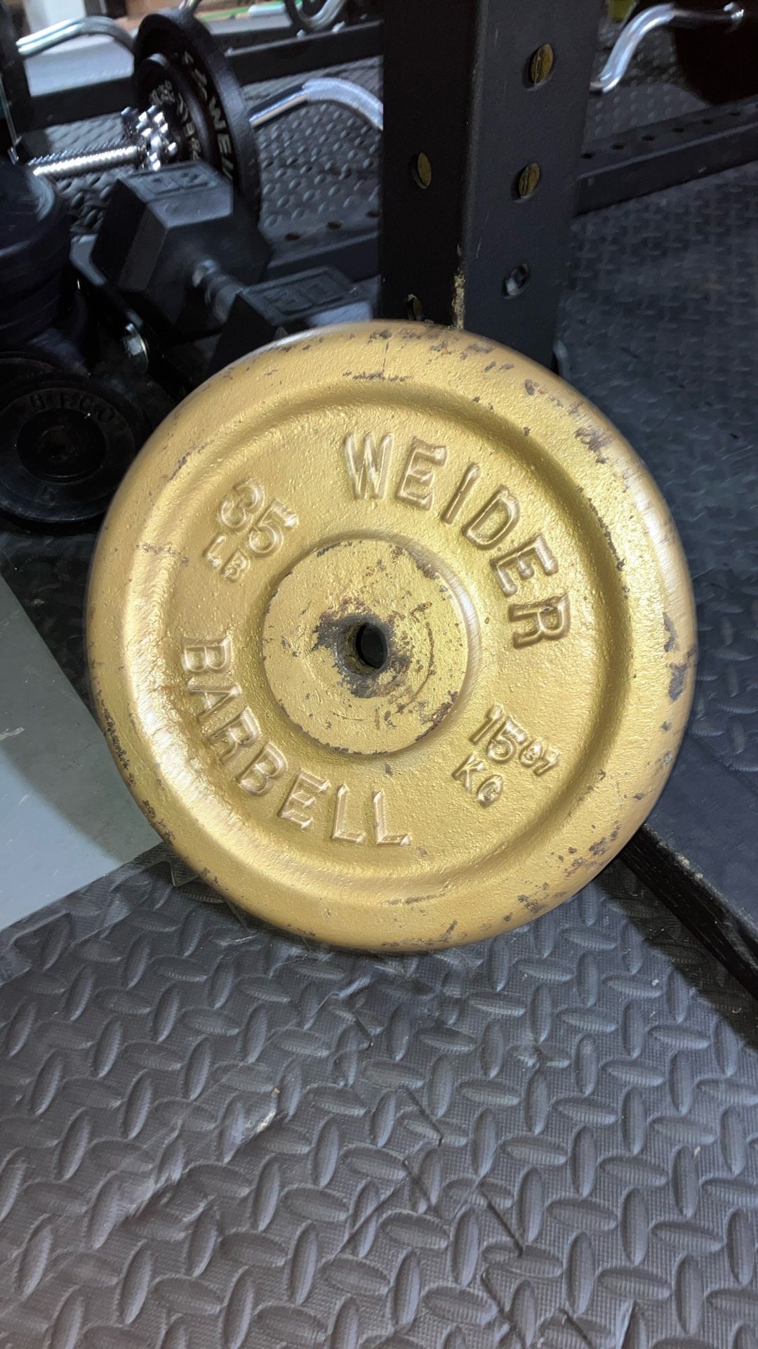 2 35lb welder Barbell Plates