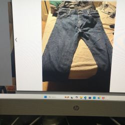 A Used-good Pair Of Men’s Levi & Strauss & Co. Blue Jeans (38x36)