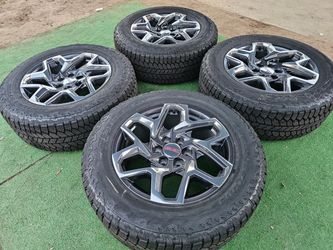 BRAND NEW GMC SIERRA WHEELS WITH NEW BRIDGESTONE DUELER AT TIRES 275/60R20