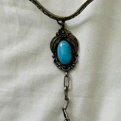 Turquoise bracelet with connected ring