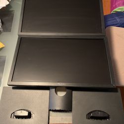 TWO NEVER BEFORE USED Dell Monitors With Standing Mounts And A Free Keyboard And Mouse  Also Includes Headset And Extension Cord
