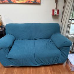 Love Seat And Couch With Blue Cover