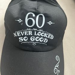 Black Baseball hat “60 Never looked So Good”Adjustable. Celebrate turning 60.