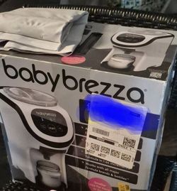 Baby brezza , , Size 1 diapers and some size 2 diapers