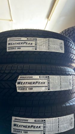 235/65r18 Bridgestone Set of 4 New Tires includes installation and balance