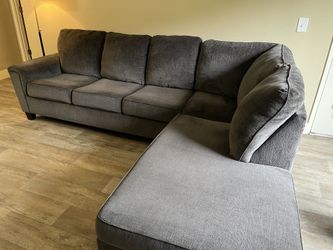 Gray L-shaped sectional couch for sale. $250 or best offer.
