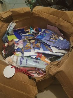 Whole box of party supplies bags ect.