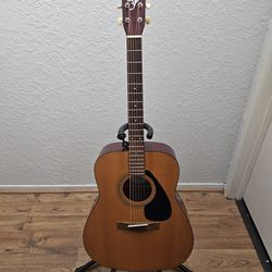 Yamaha (FG300A) acoustic guitar & hardcase.