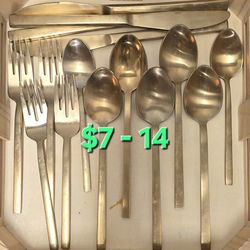 Gold Colored Utensil Set of Forks, Knives, and Spoons