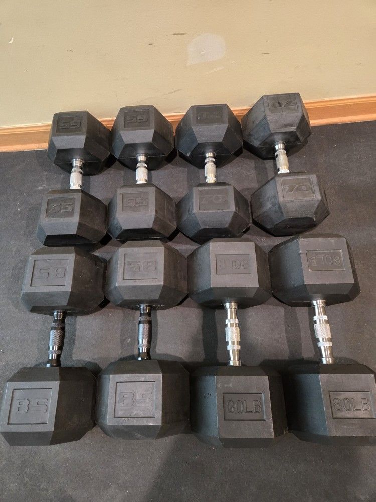 Used 65lb, 70lb, 80lb, And 85lb Rubber Hex Dumbbells
