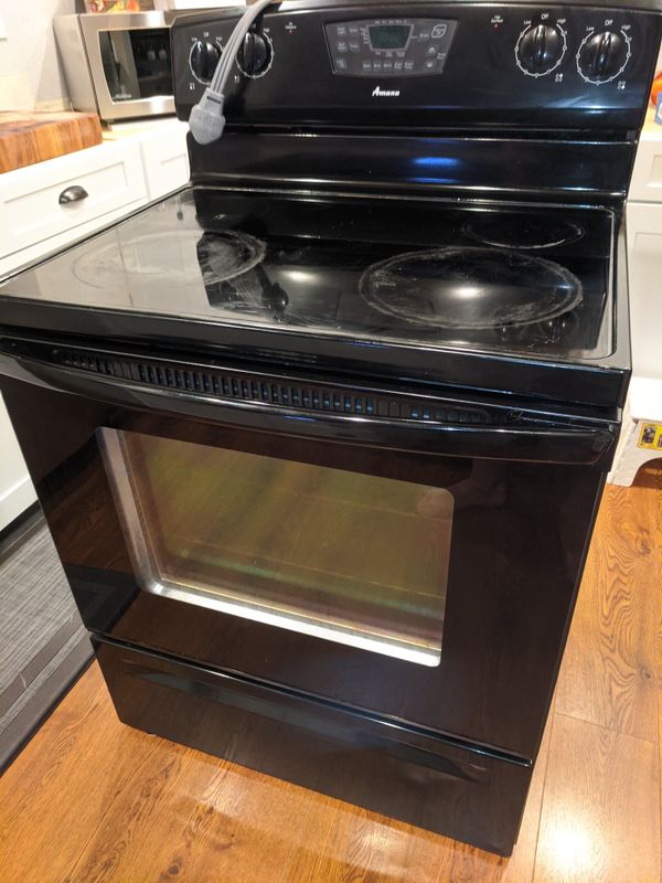 amana stove f2