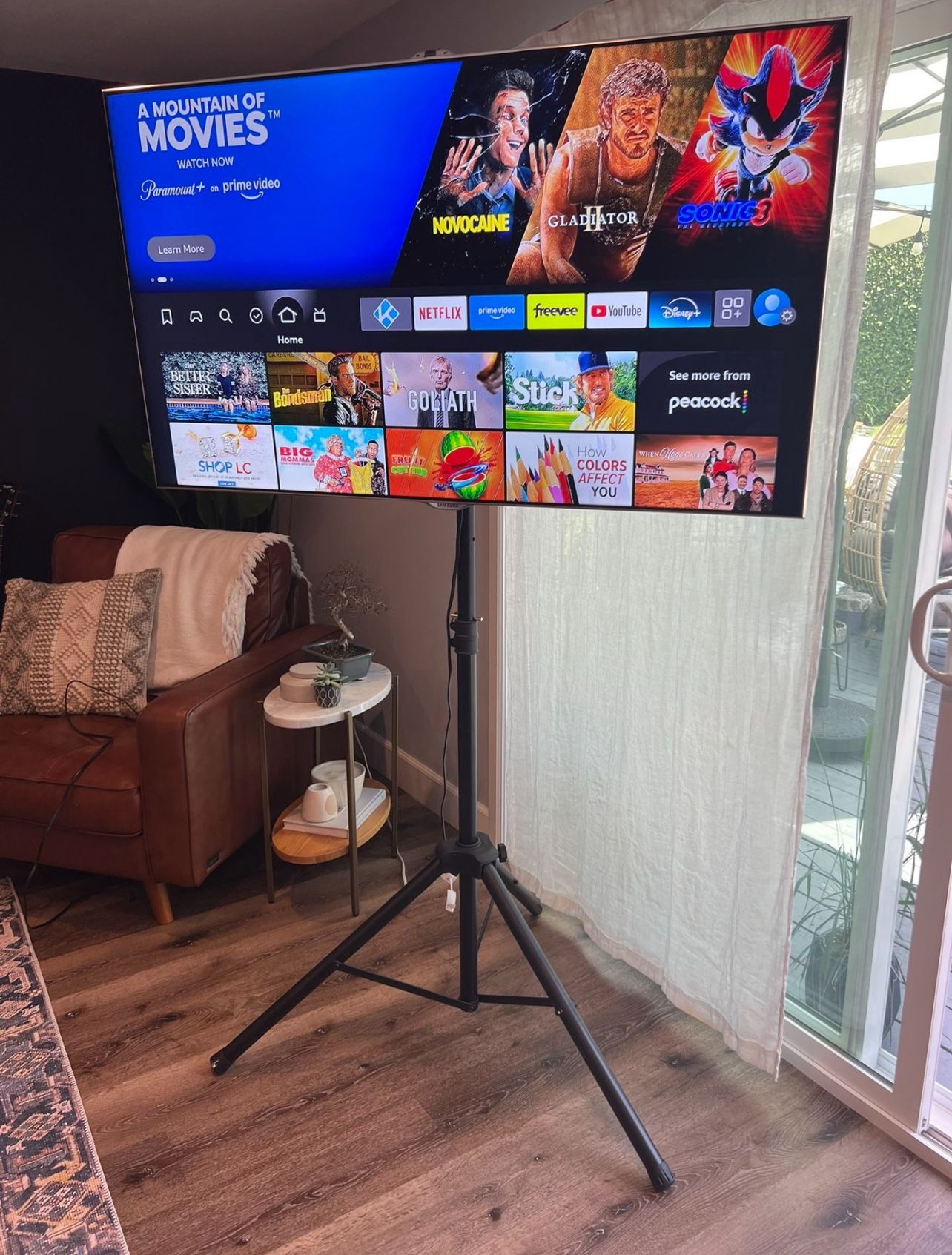55” Samsung TV and tripod mount