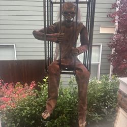 Zombie In Cage Prop