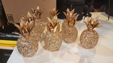 beautiful gold metal pineapples