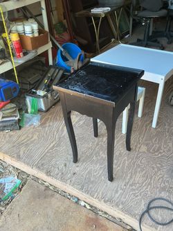 Nice table 24 inches tall and 19 by 19 inches across the top