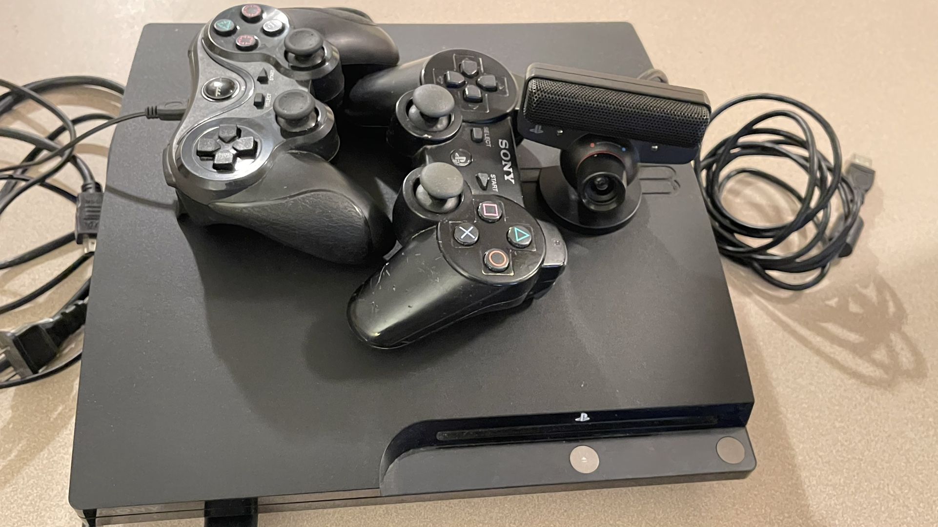 🎮 PS3 Gaming Bundle – 7 Games + 2 Controllers + Camera – Clean & Ready to Play!