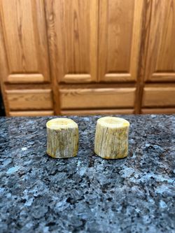 Vintage petrified Wood pair of Salt and Pepper Shakers.  Size approximately 1 1/2 inches tall.  Preowned new never.
