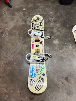 Snowboard with Bindings and Stickers